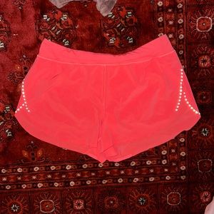 Hot pink Lululemon high waisted running shorts